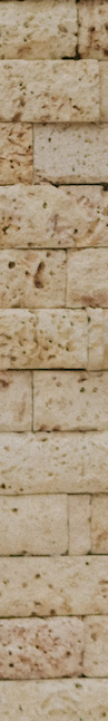 A stack of textured stone bricks
